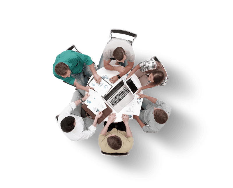 Group collaborating around a table from above
